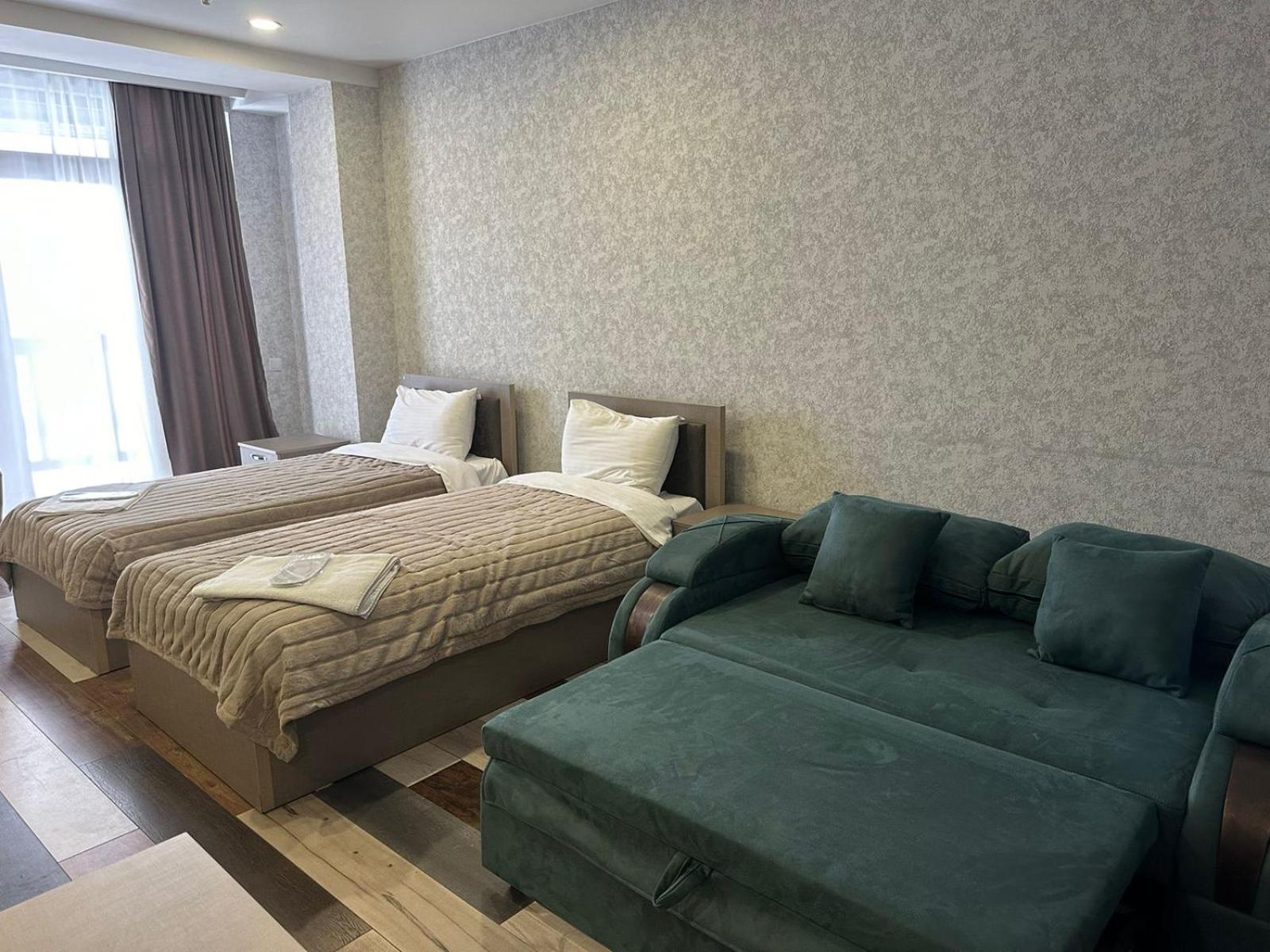Hotel Qumli Goedaoeri Buitenkant foto